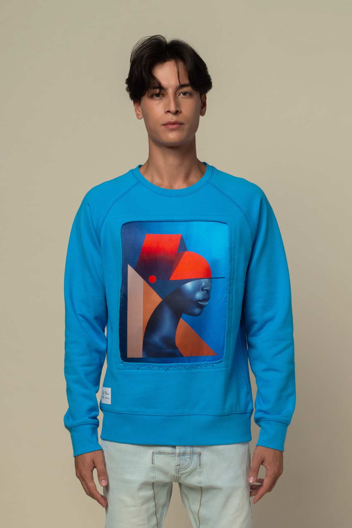 Sweat bleu avec patch soie "Serieuse"