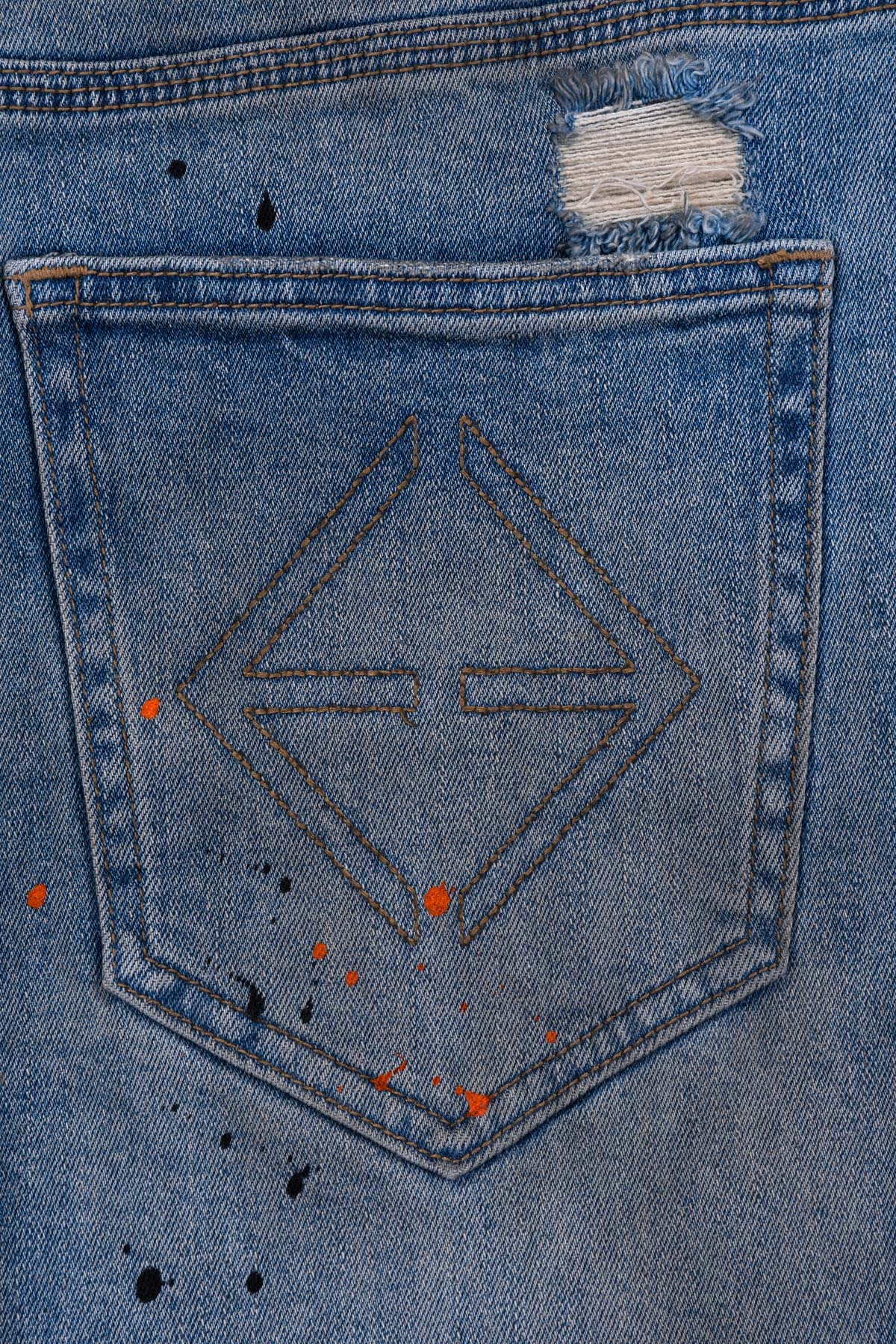 Jean Homme used brodé au dos